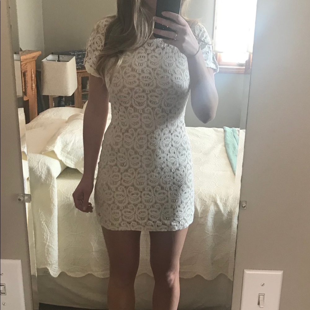 White and cream bodycon lace dress. Size medium